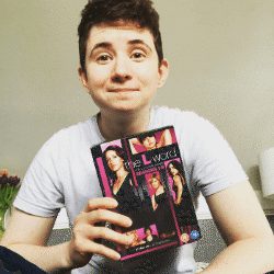 Person holding DVDs